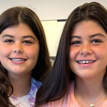 Twins with braces at an orthodontic office near Chicago's West Suburbs.